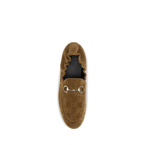 Gucci Bos Taurus Slipper aus braunem Kalbsleder