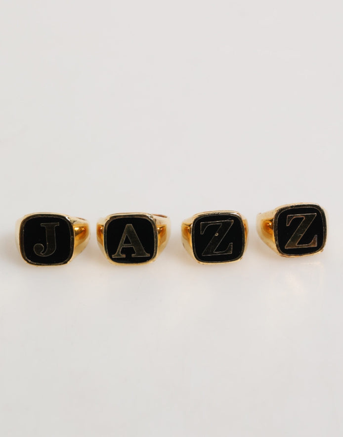 Dolce & Gabbana Gold Tone Brass JAZZ Letter Set 4 Pieces Adjustable Ring Dolce & Gabbana