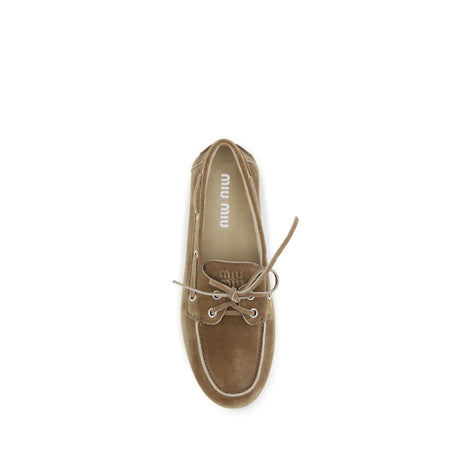 Miu Miu Beige Calf Leather Bos Taurus Slip-On Loafers Miu Miu
