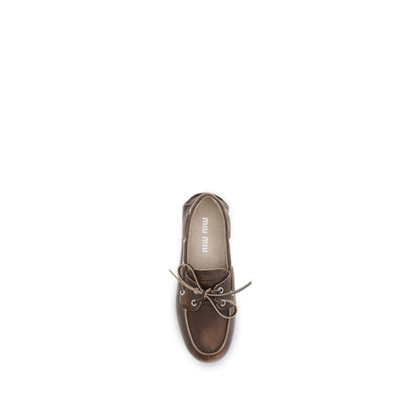 Miu Miu Brown Calf Leather Bos Taurus Slip-On Loafers Miu Miu